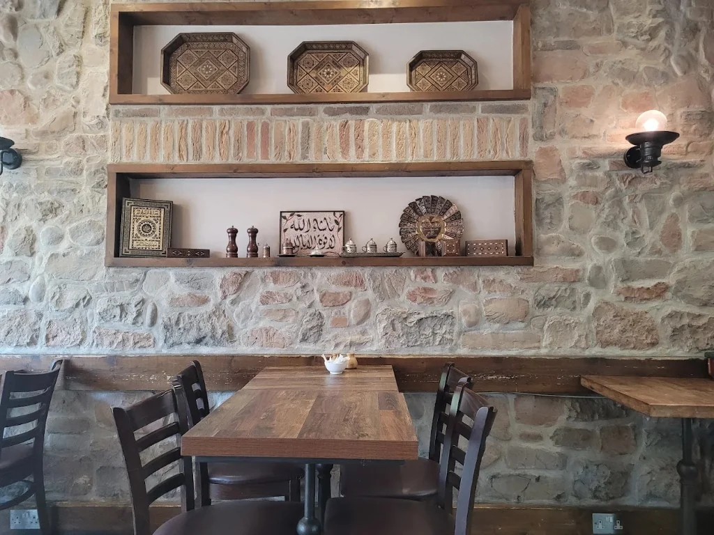 Damascene Bakery interior with traditional Syrian decor and wood-fired oven atmosphere